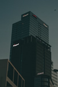 a very tall building with a sky background