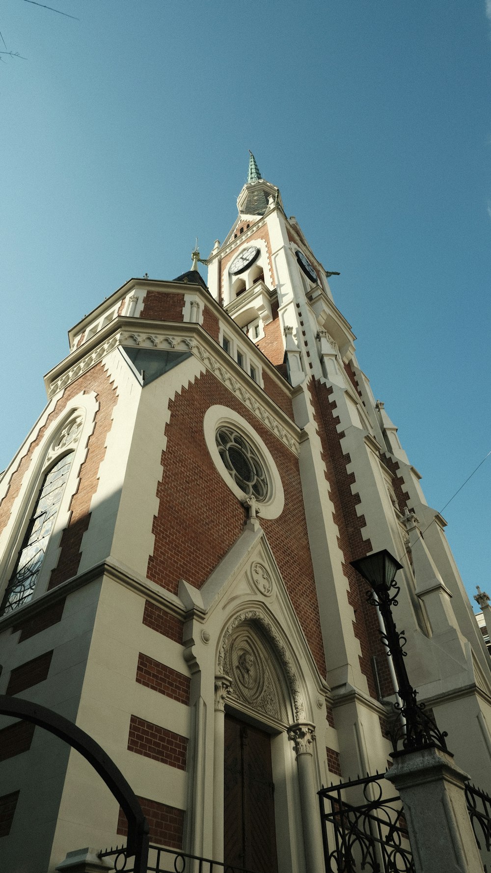 a tall building with a clock on the top of it