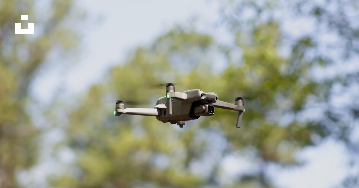 Flying Camera Images A close up of a camera attached to a flying object photo – Free Animal ...