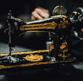 a close up of a sewing machine on a table