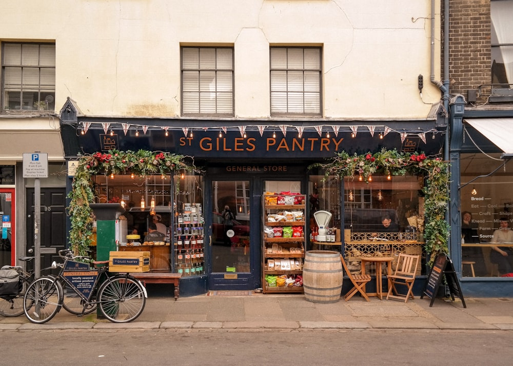 a store front with a bicycle parked in front of it