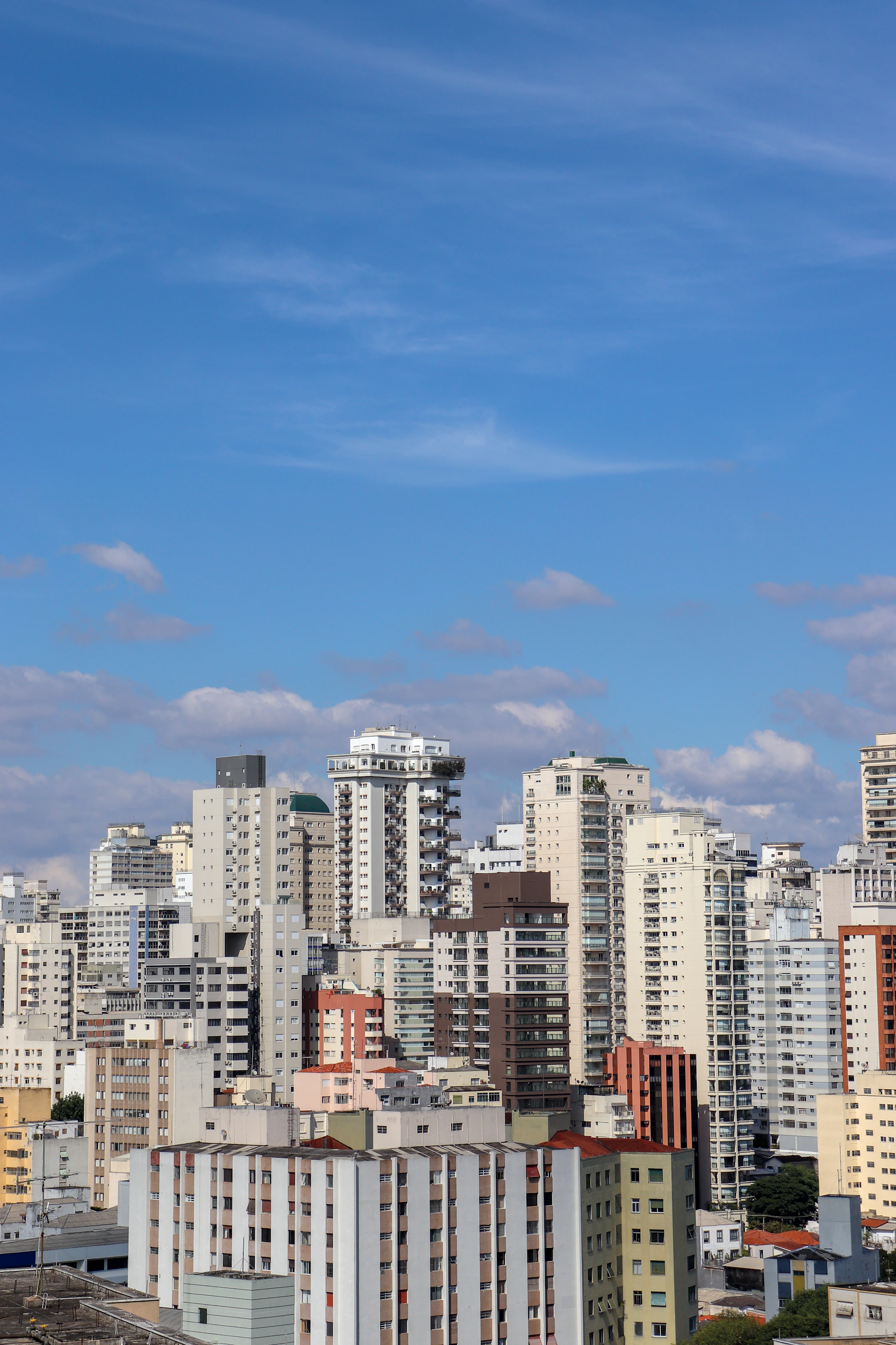a view of a city with tall buildings