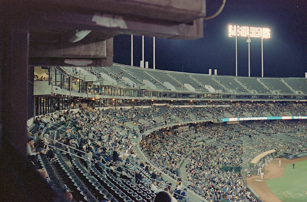 a baseball stadium filled with lots of people