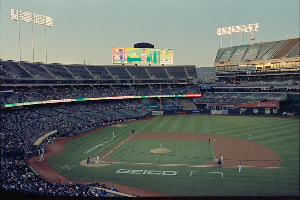 a baseball stadium filled with lots of people