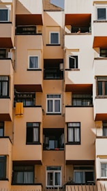 a tall building with balconies and balconies on each floor