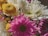 A close-up of a beautifully arranged bouquet with vibrant flowers.
