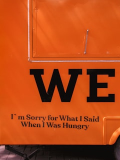 A close-up of a handwritten apology letter from a company to its clients.