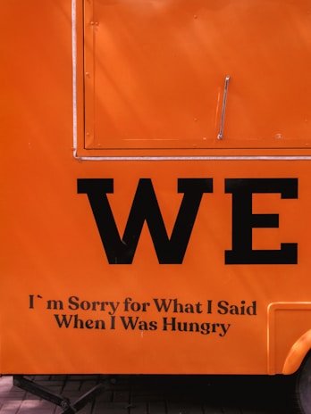 A close-up of a handwritten apology letter from a company to its clients.