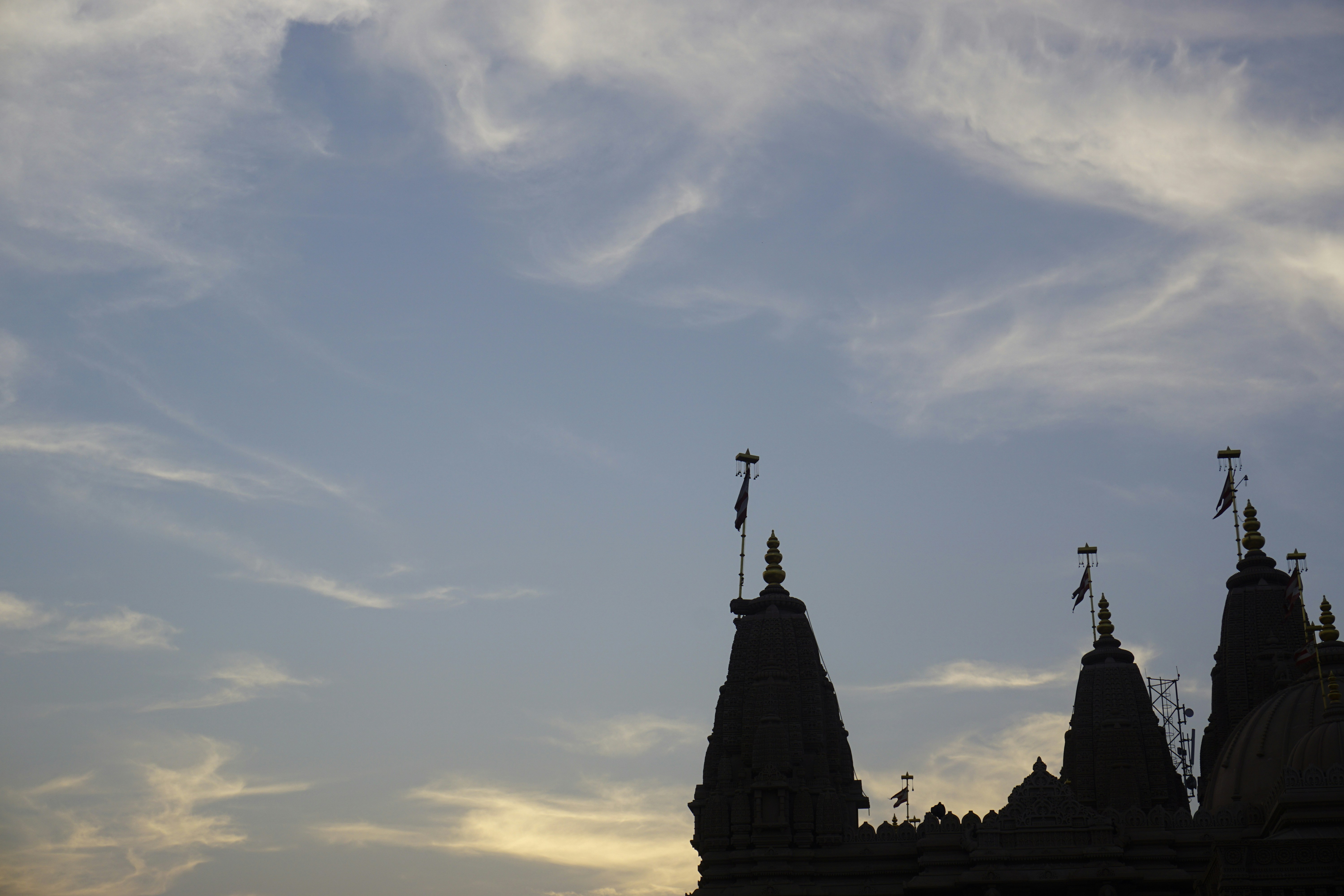 Temple silhouette against sunset