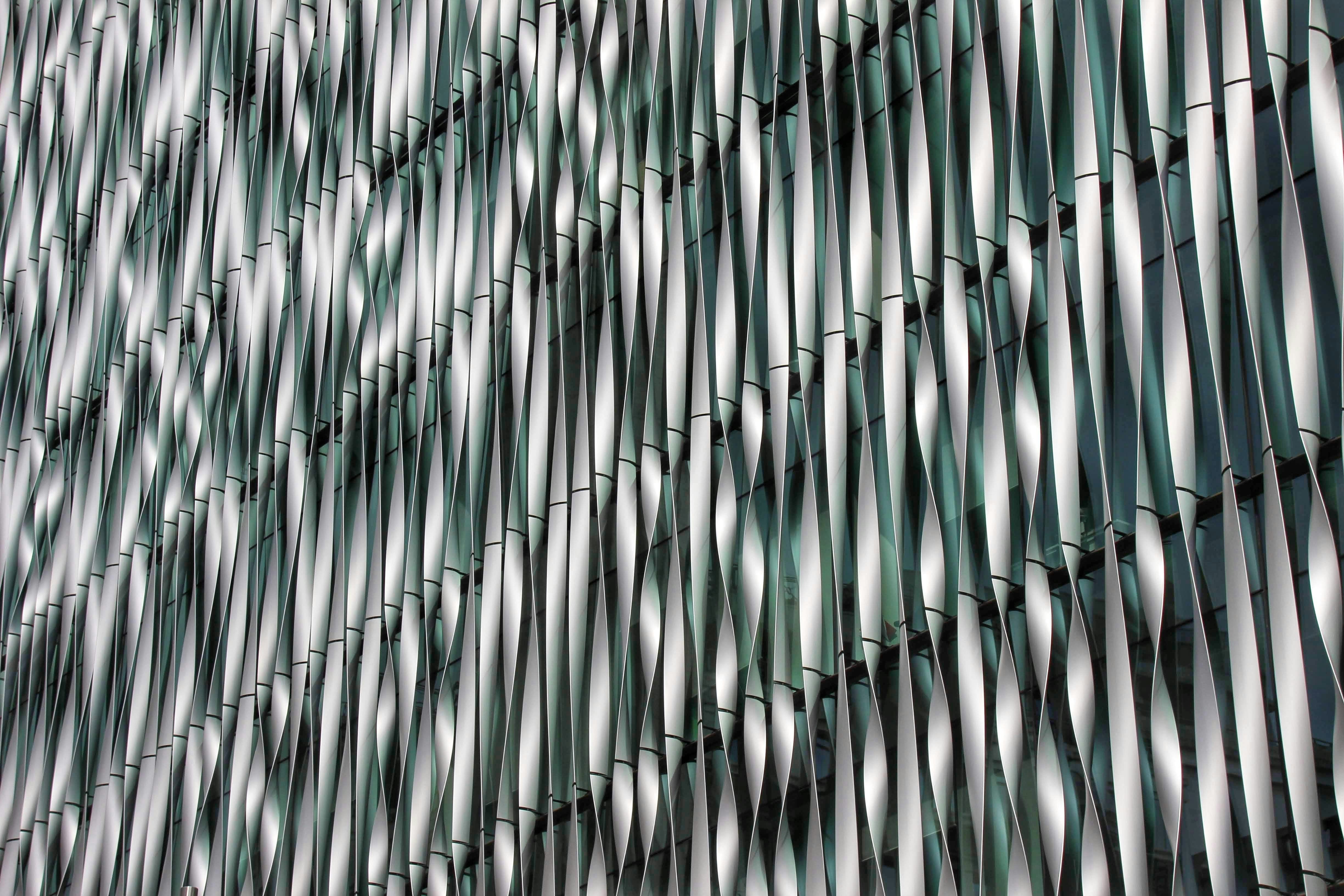 a close up of a building made of metal pipes