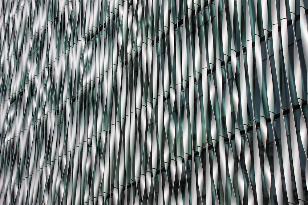 a close up of a building made of metal pipes