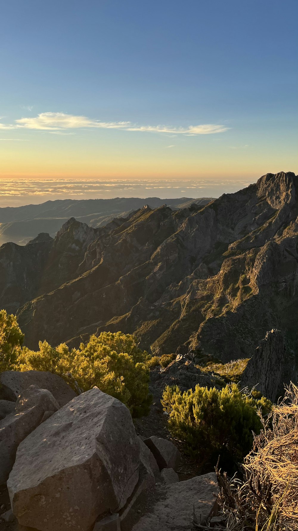 a view of a mountain range at sunset