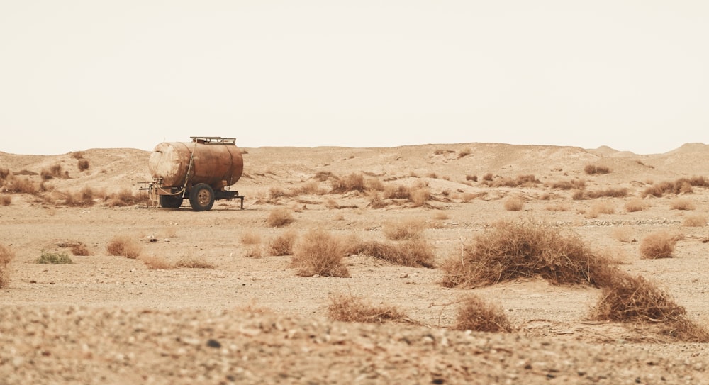 a truck is driving through the desert