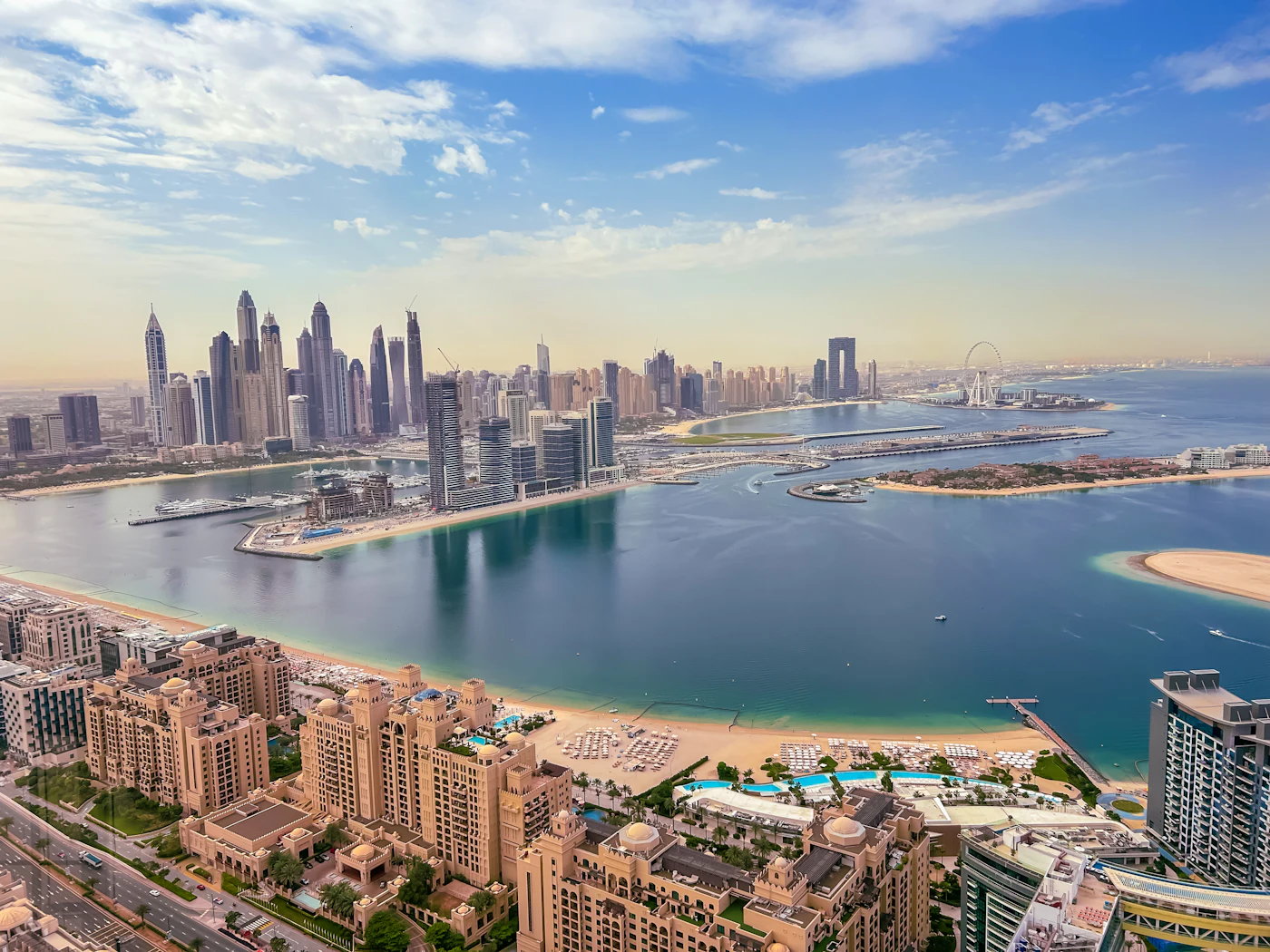 Aerial view of a Dubai district beside a body of water