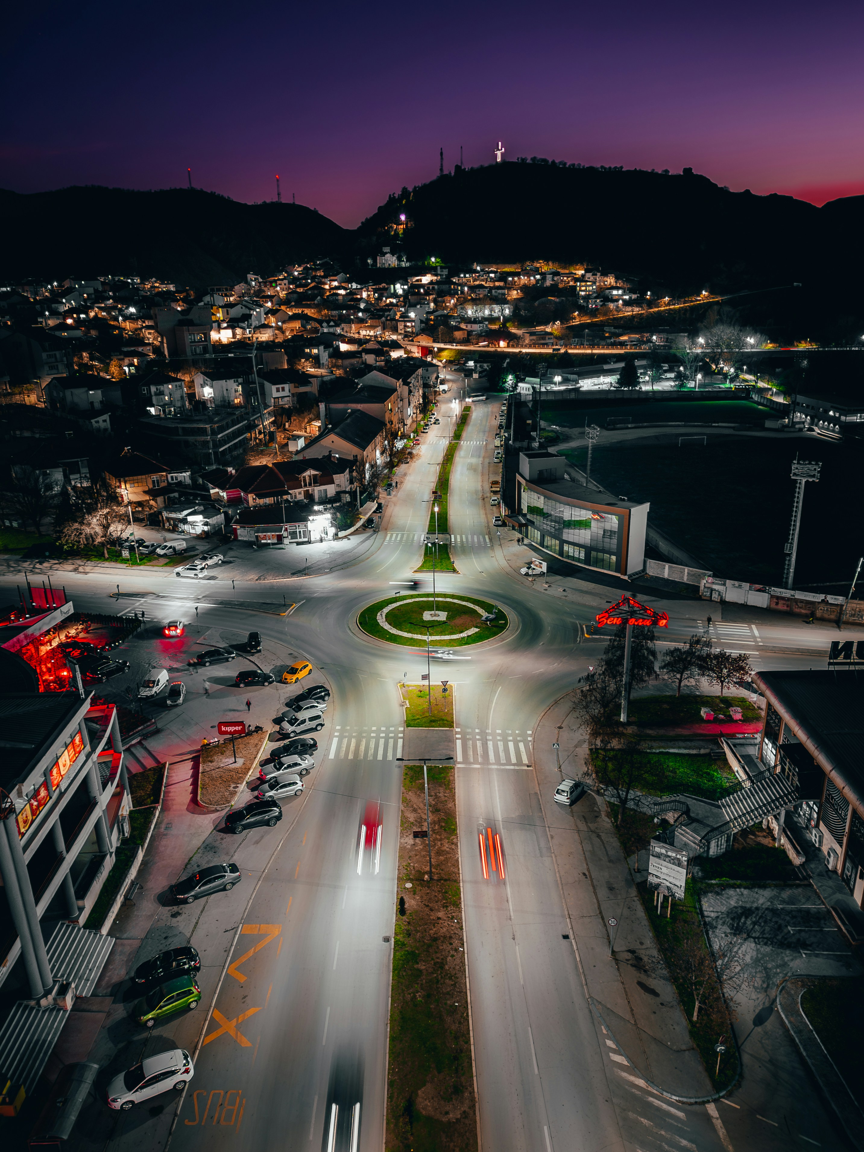 an aerial view of a city at night