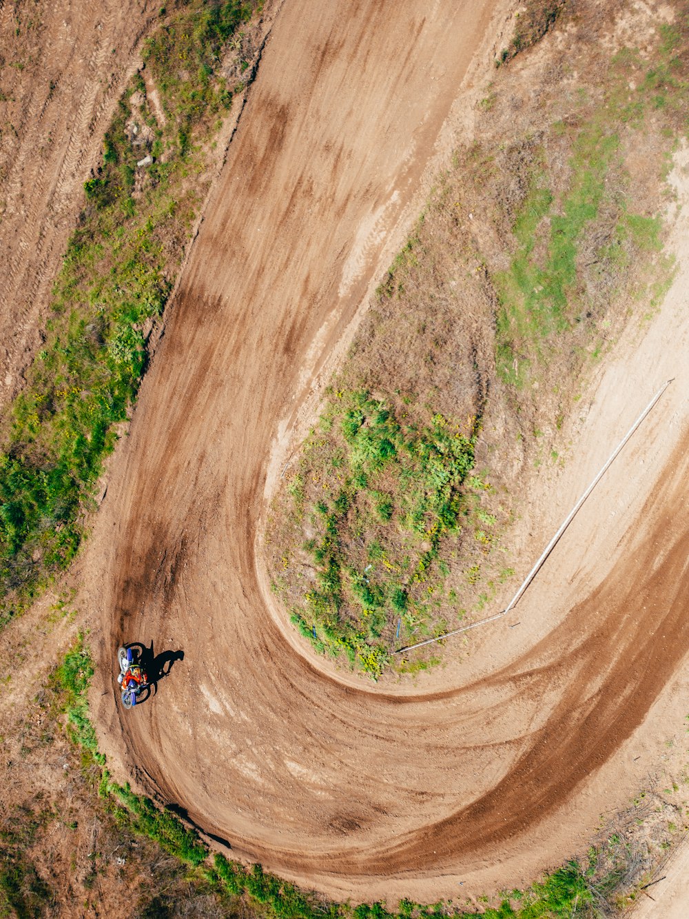 an aerial view of a dirt bike track