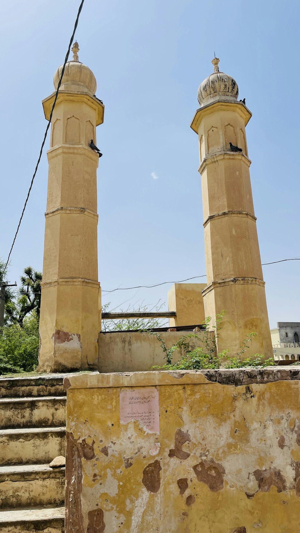 a couple of tall towers sitting next to each other