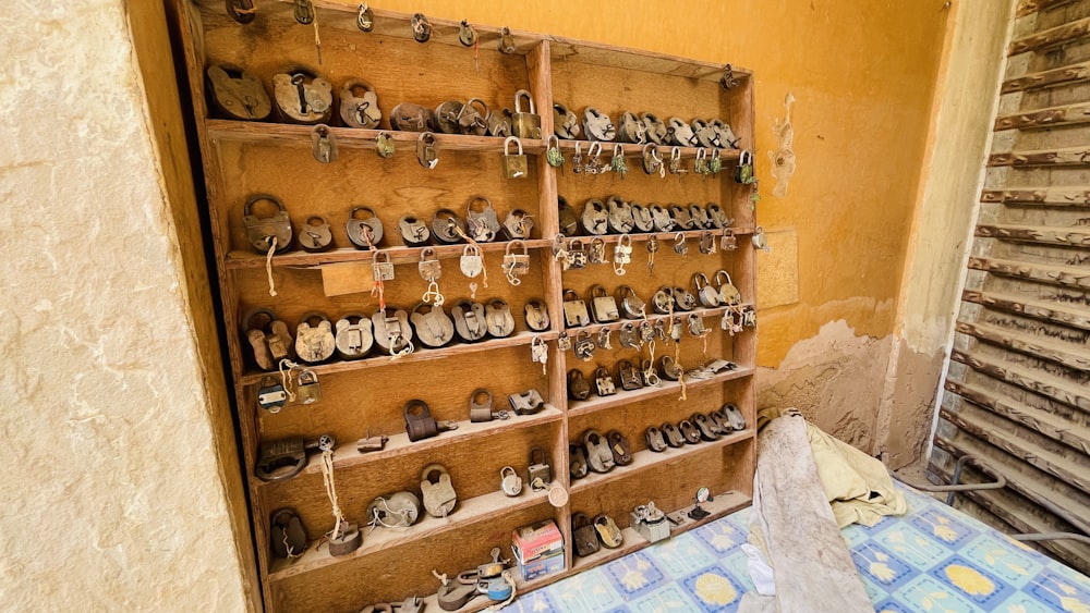 a bunch of shoes that are on a wall