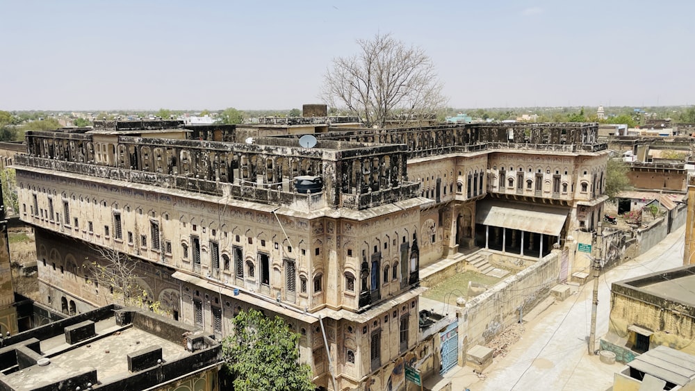 an old building with a lot of windows and balconies