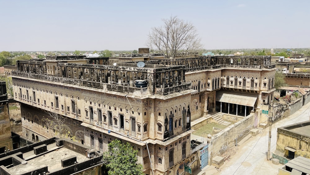 an old building with a lot of windows and balconies