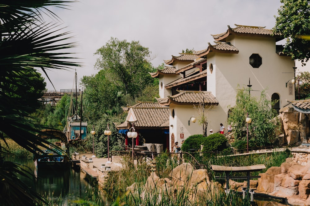 a house with a pond in front of it