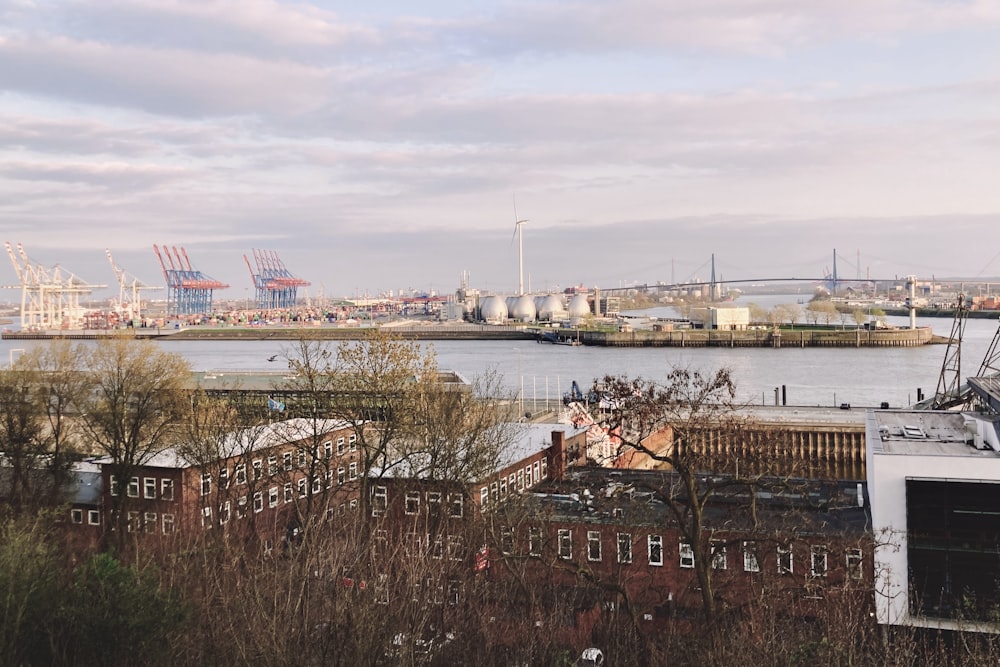 a large body of water with a city in the background