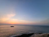 Sunrise over the ocean as seen from the Putera Rezky boat deck