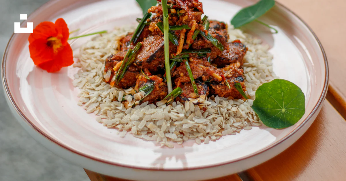 A white plate topped with rice and meat photo – Free Nepal Image on ...