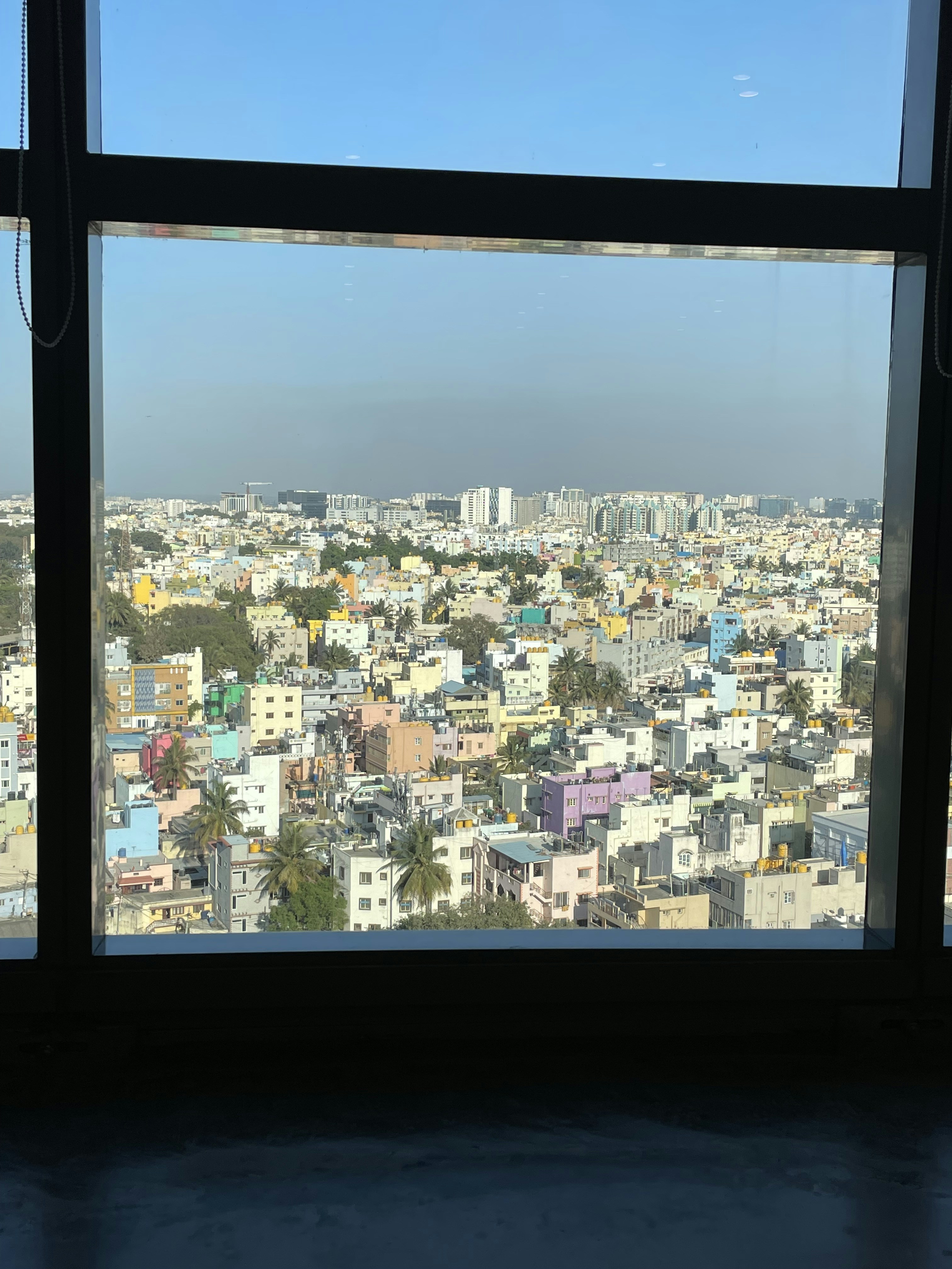 A view of a city from a window photo – Free Image on Unsplash