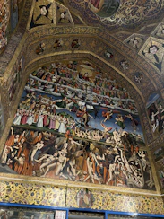 An artist painting a contemporary interpretation of Dante's Divine Comedy.