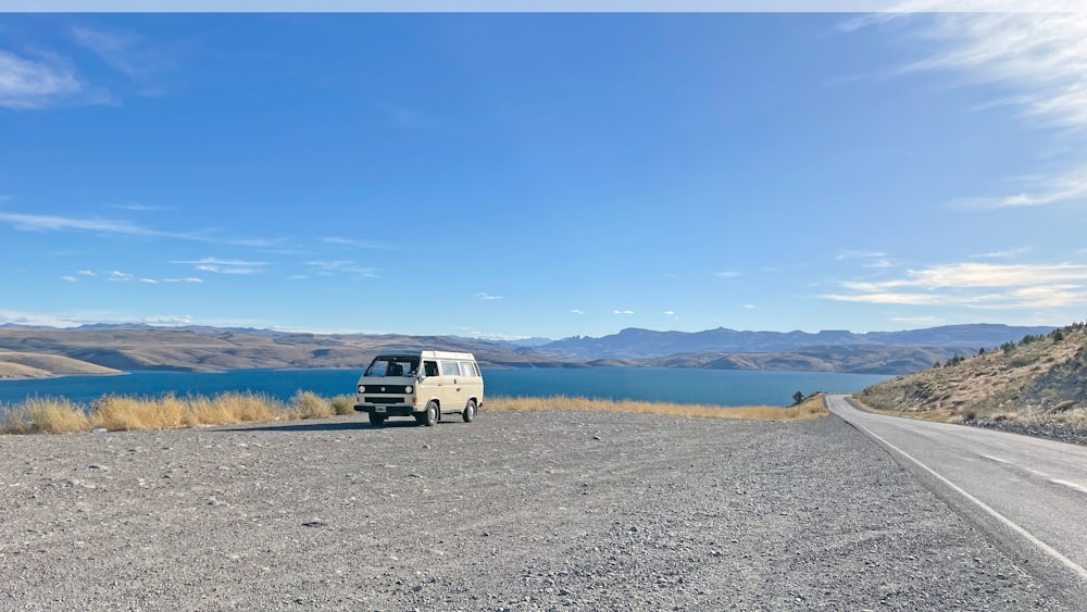 a van is parked on the side of the road