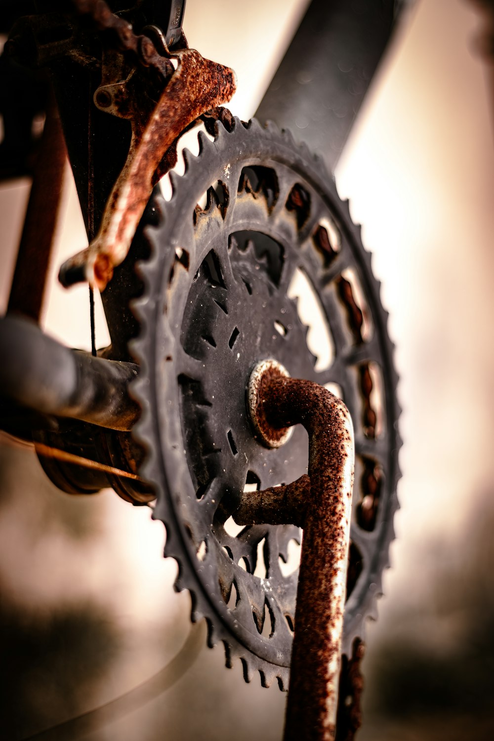 a close up of a bike's gears and chain