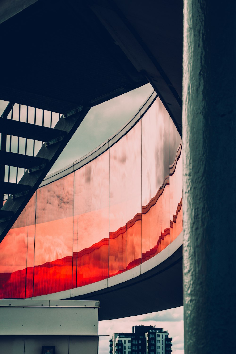 a building with a red and white stripe on it