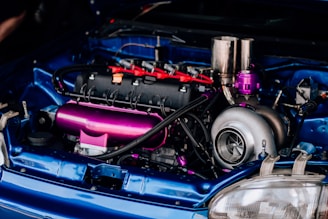 the engine of a blue car is shown
