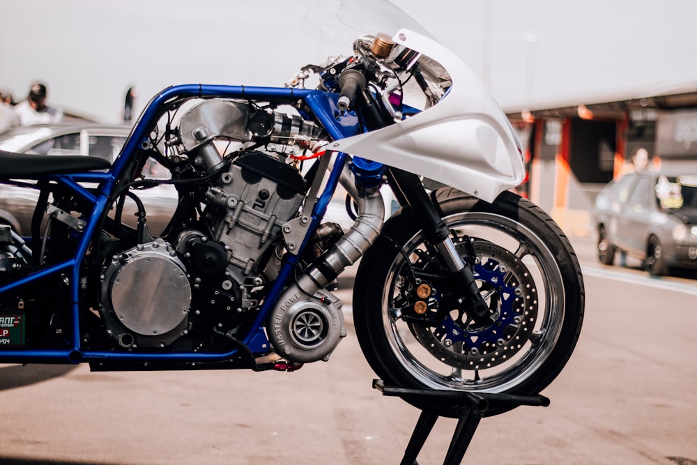 a motorcycle parked on the side of a road