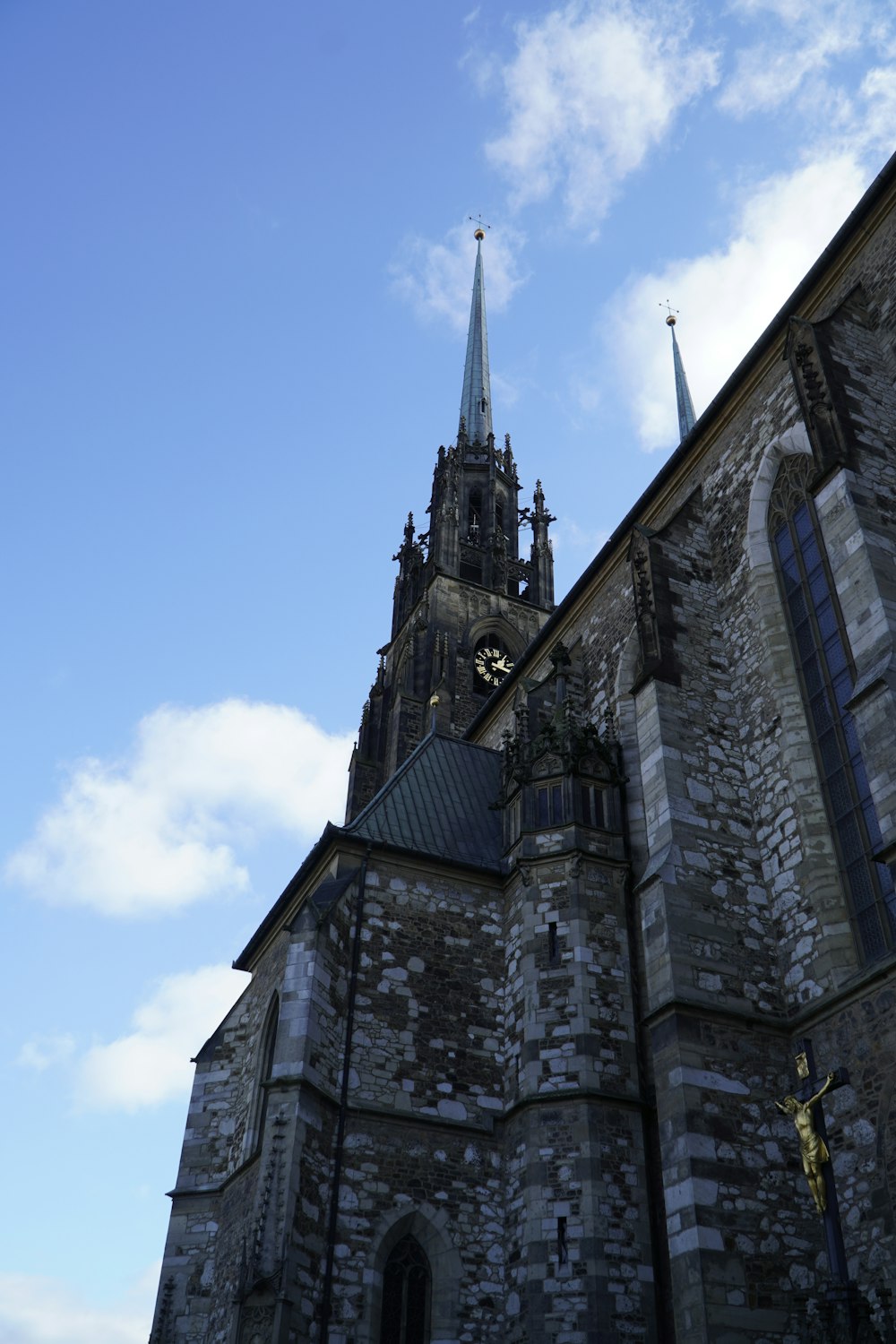 a church with a steeple and a clock on it