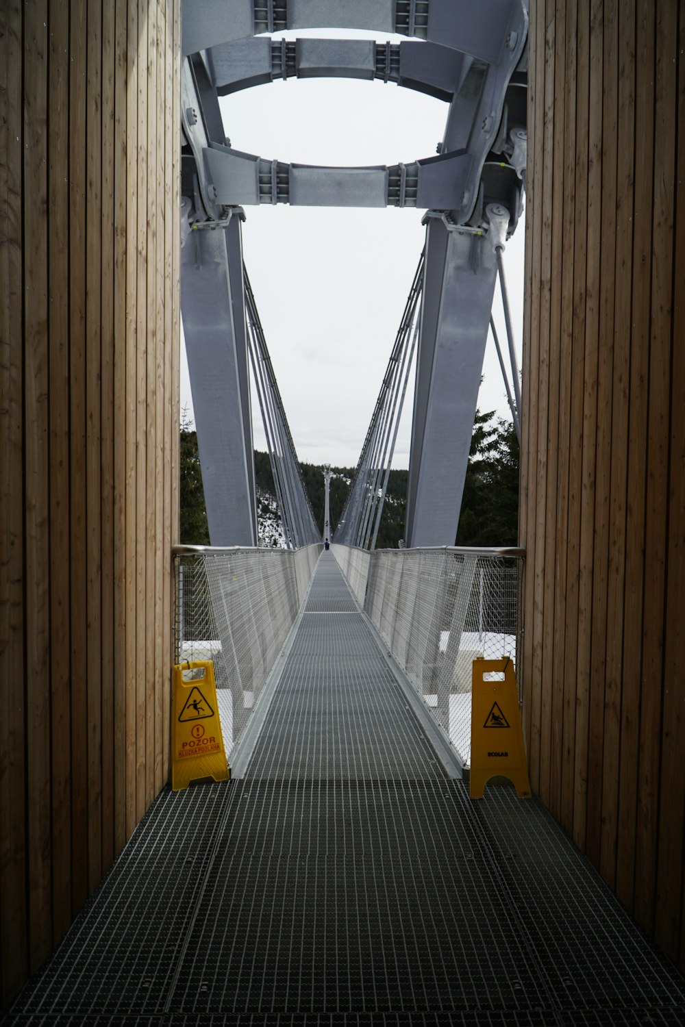 a bridge that has a sign on the side of it