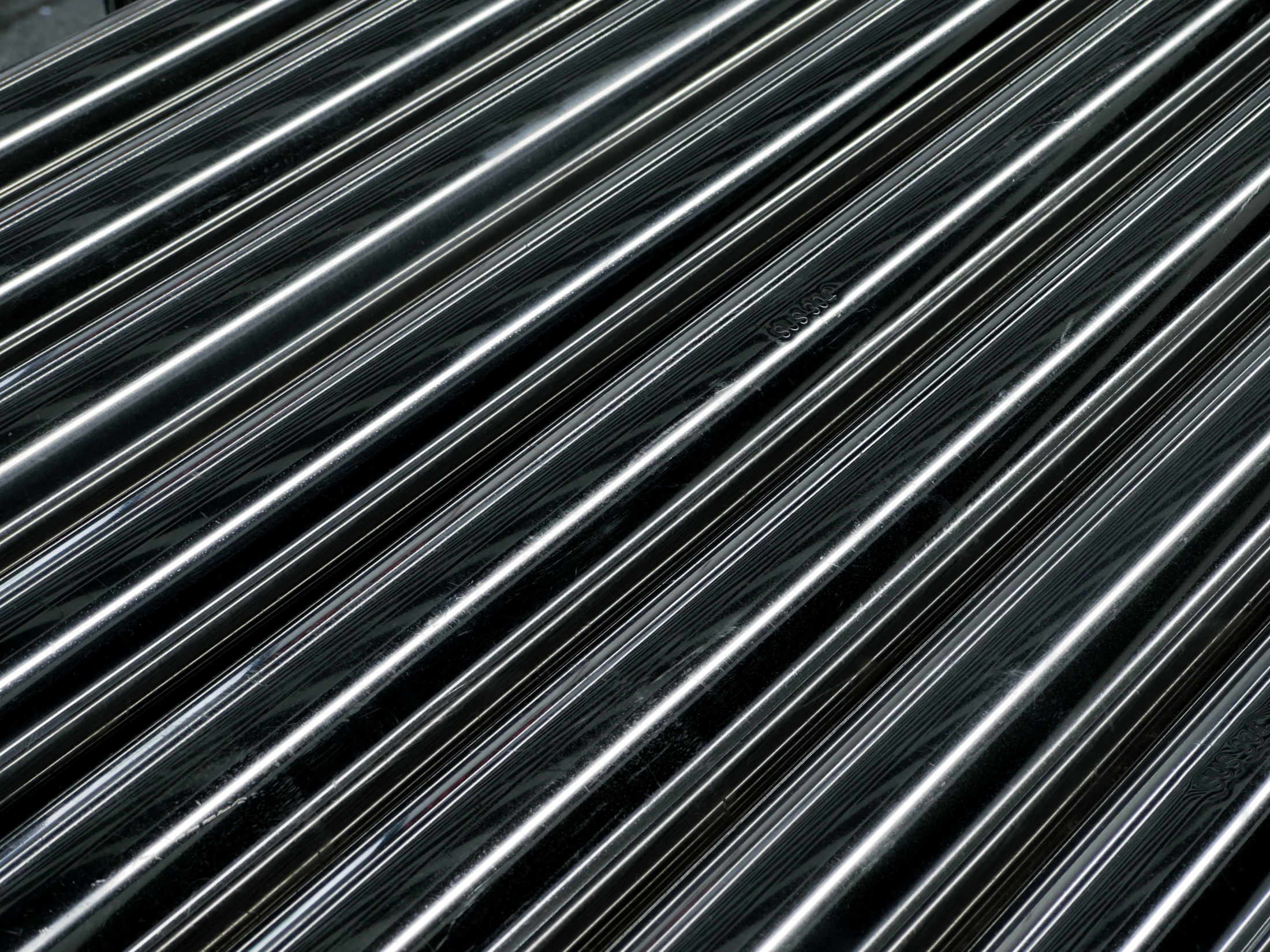 Thick solid round steel bars with circular ends visible