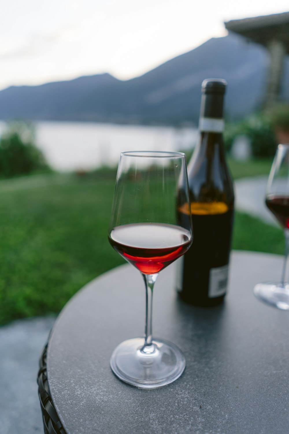 a couple of wine glasses sitting on top of a table