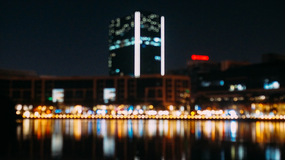 a view of a city at night from across the water