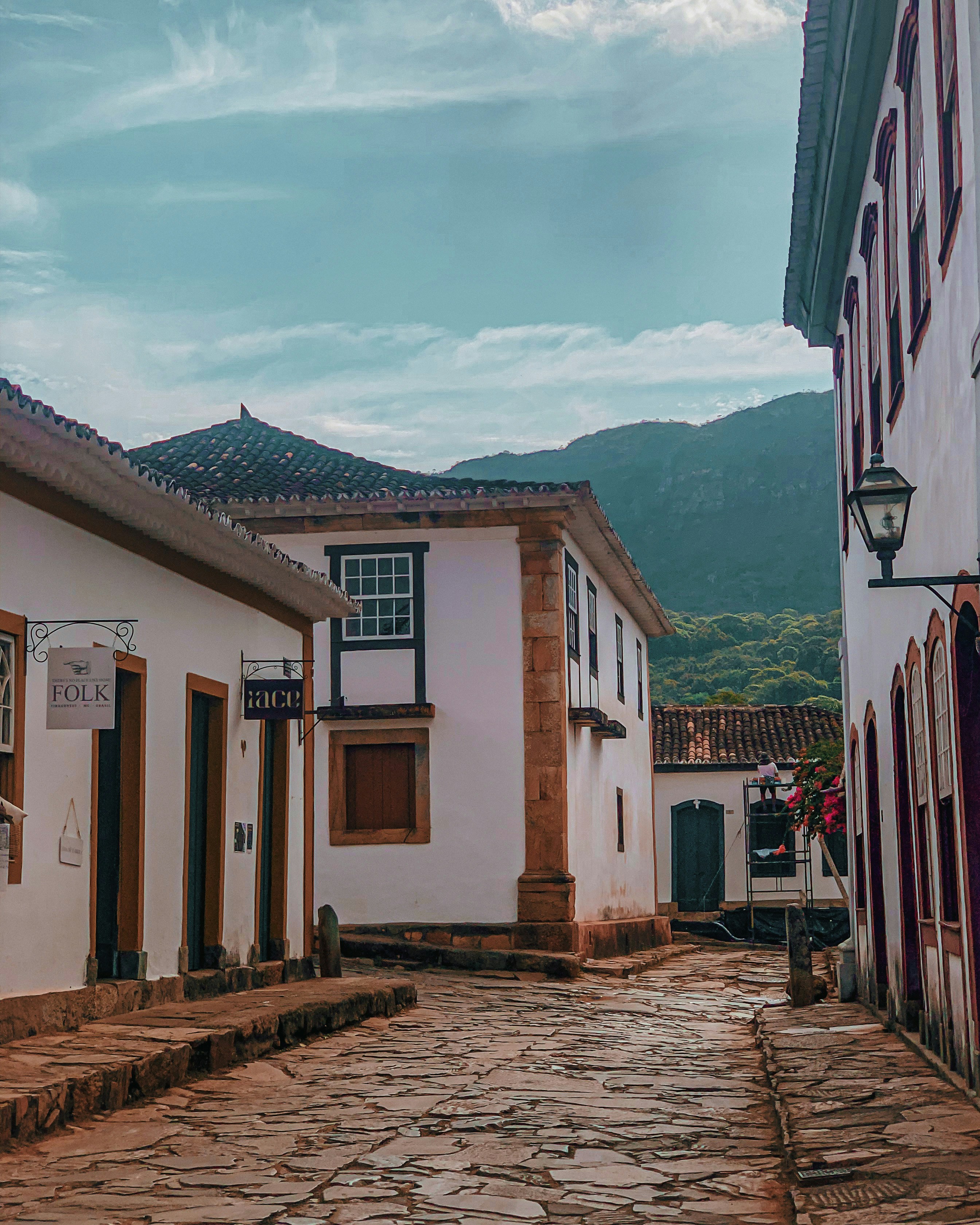 a cobblestone street in a small village