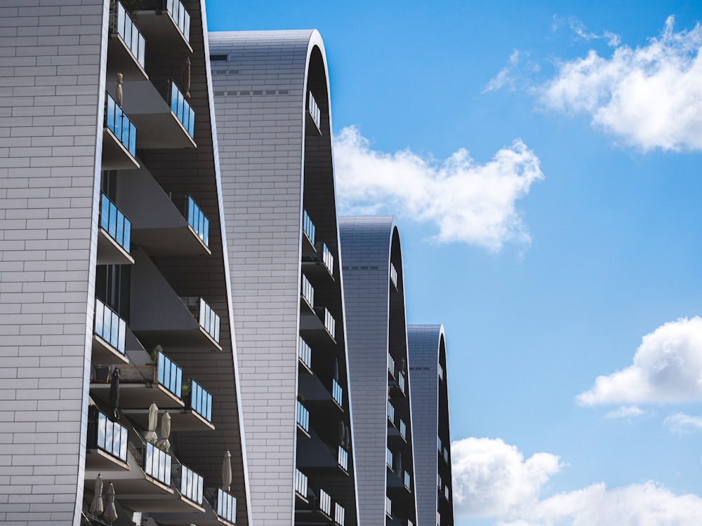 a tall building with balconies and balconies on the side