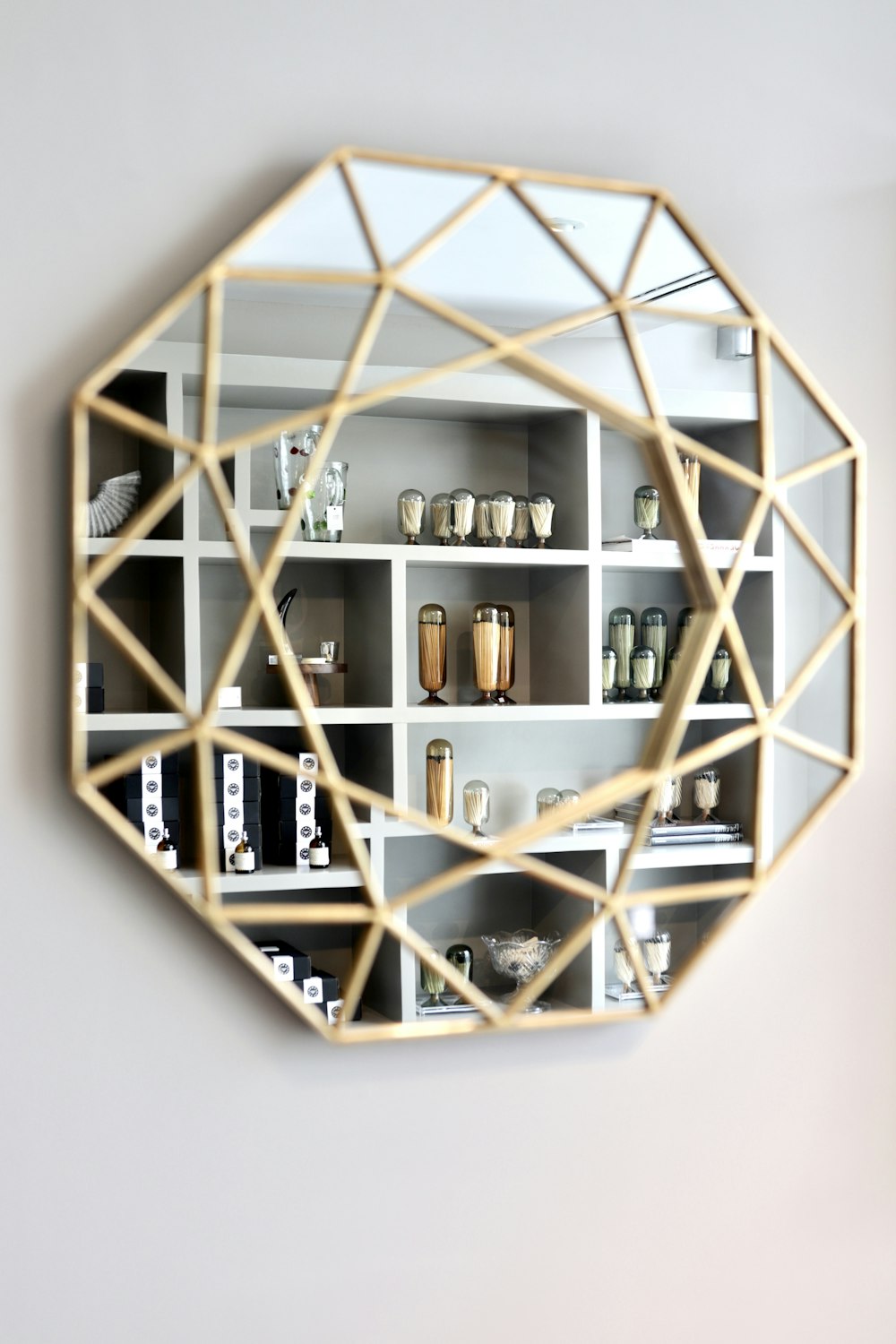 a mirror that is sitting on a wall