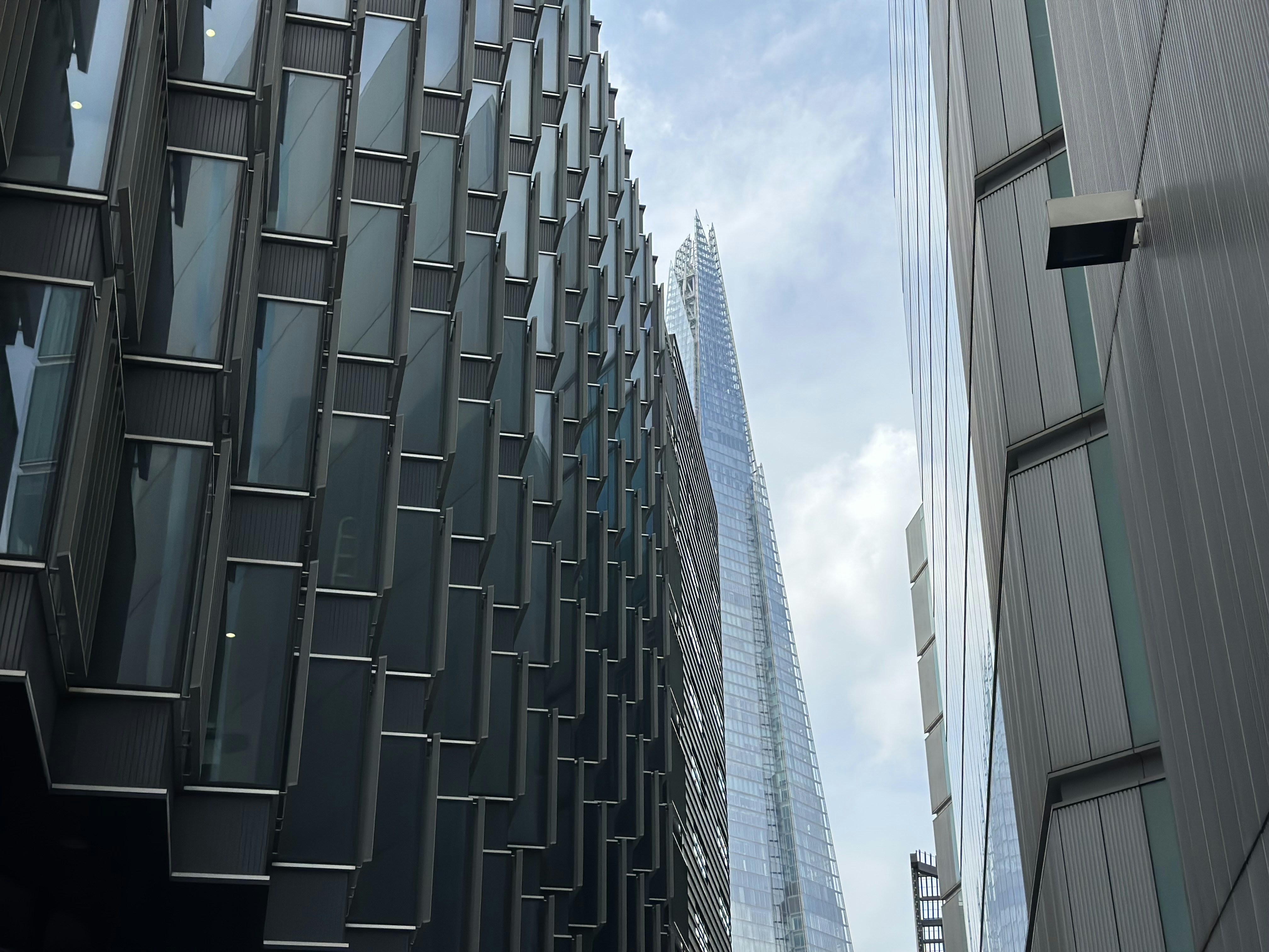 a couple of tall buildings next to each other