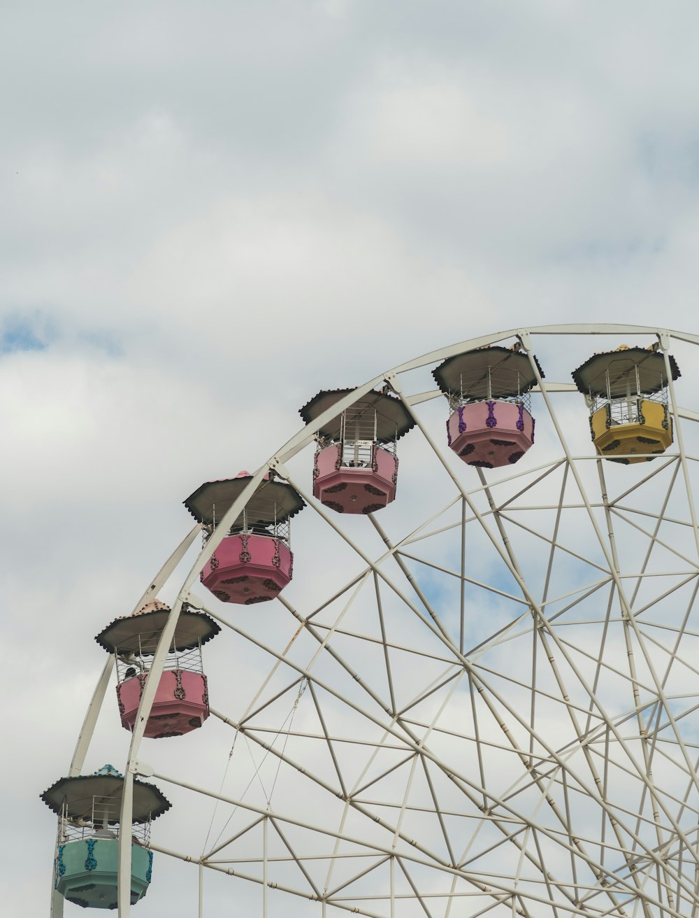 a ferris wheel with a bunch of seats on top of it