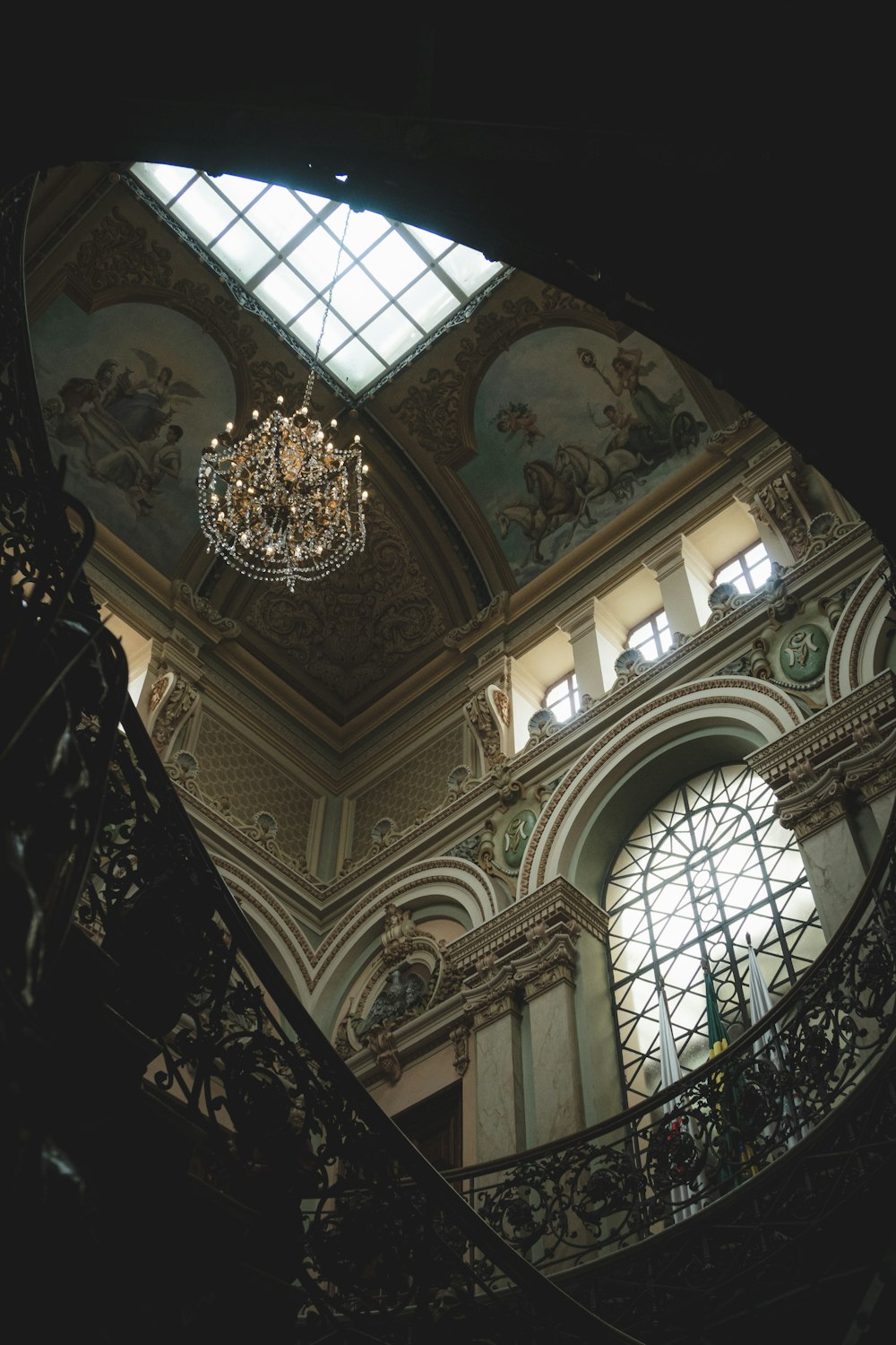 a chandelier hanging from the ceiling of a building