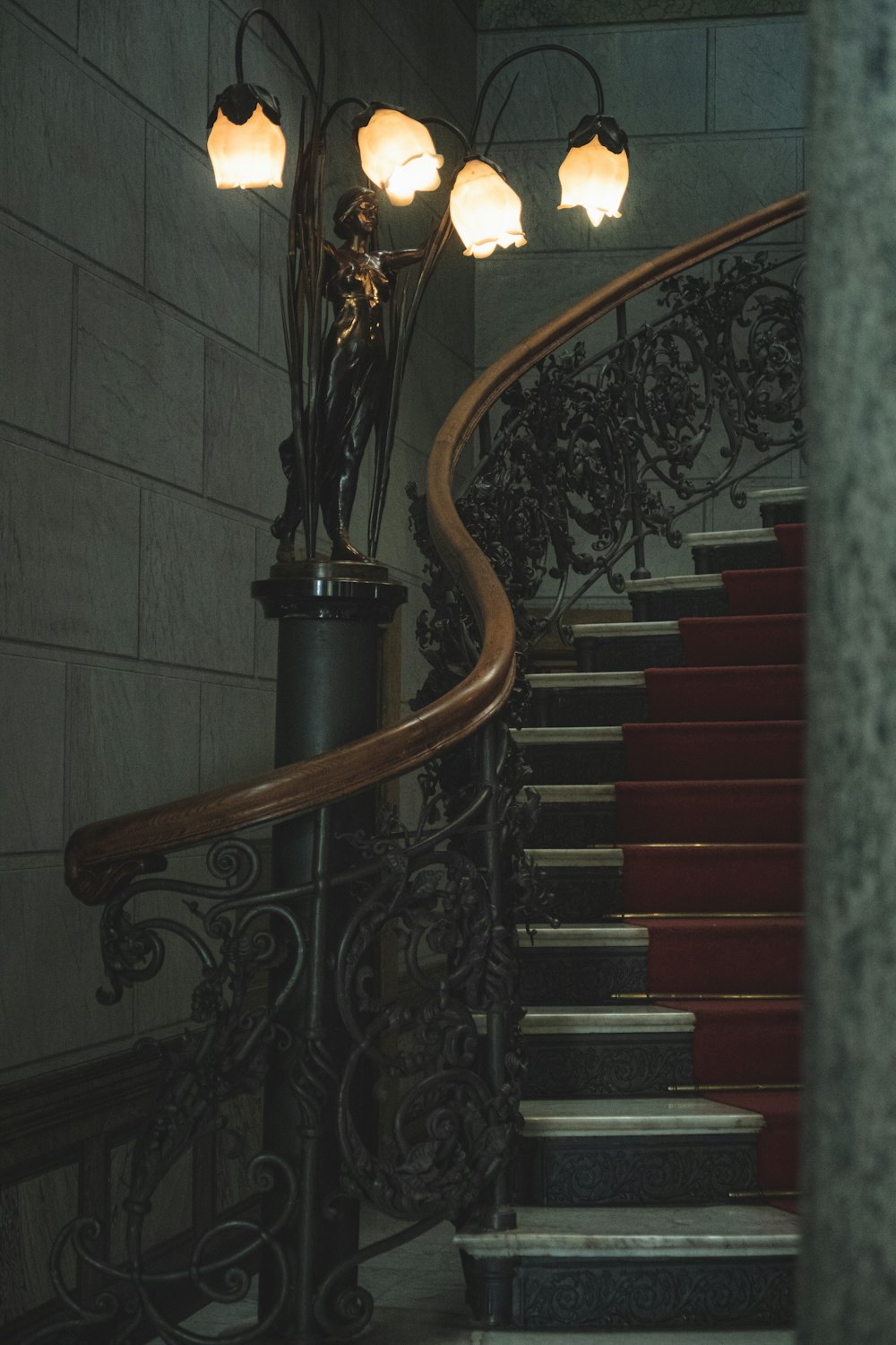 a set of stairs with a lamp on top of it