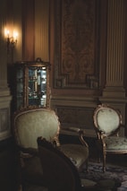 a couple of chairs that are in a room