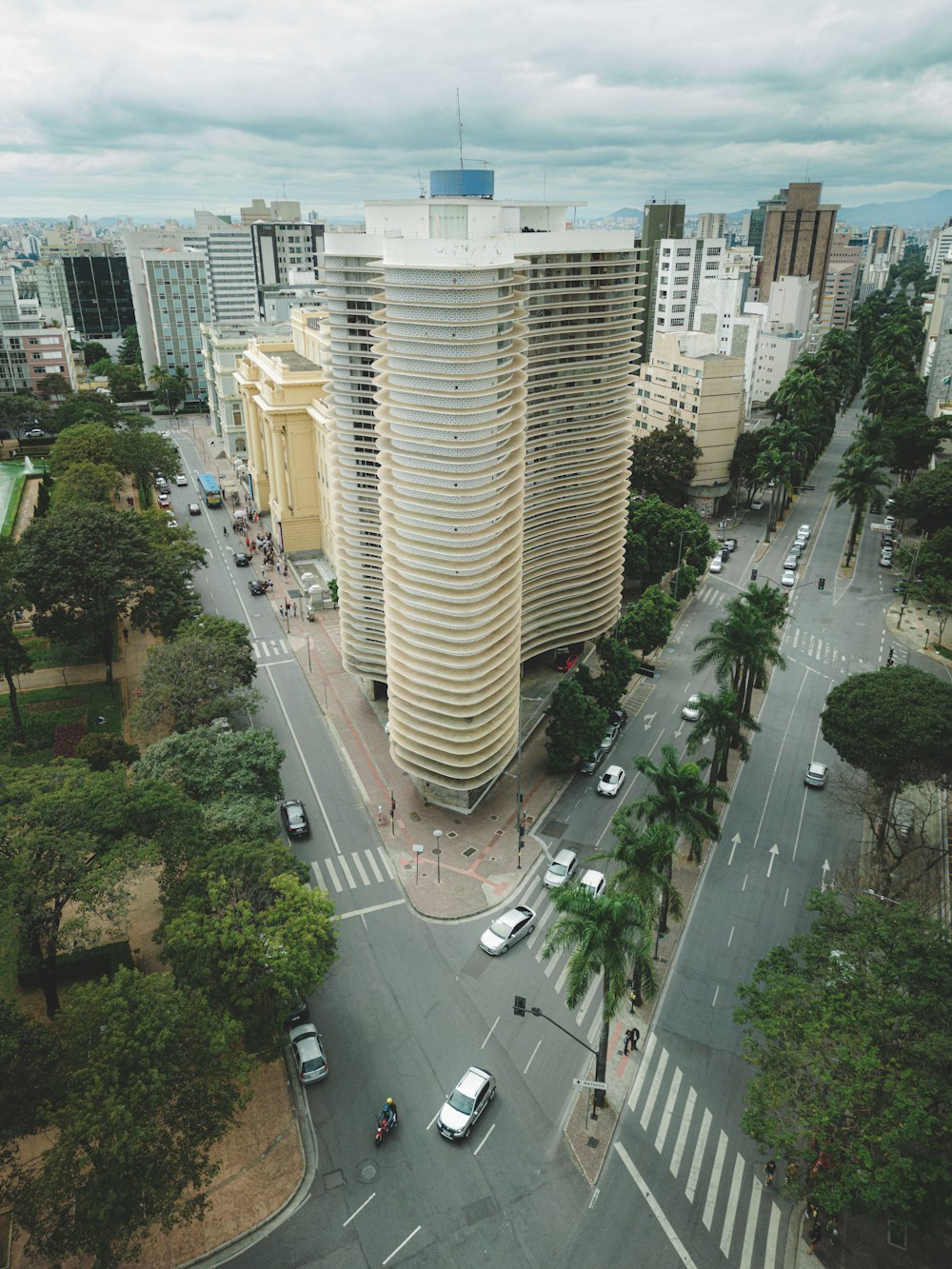 an aerial view of a city with tall buildings