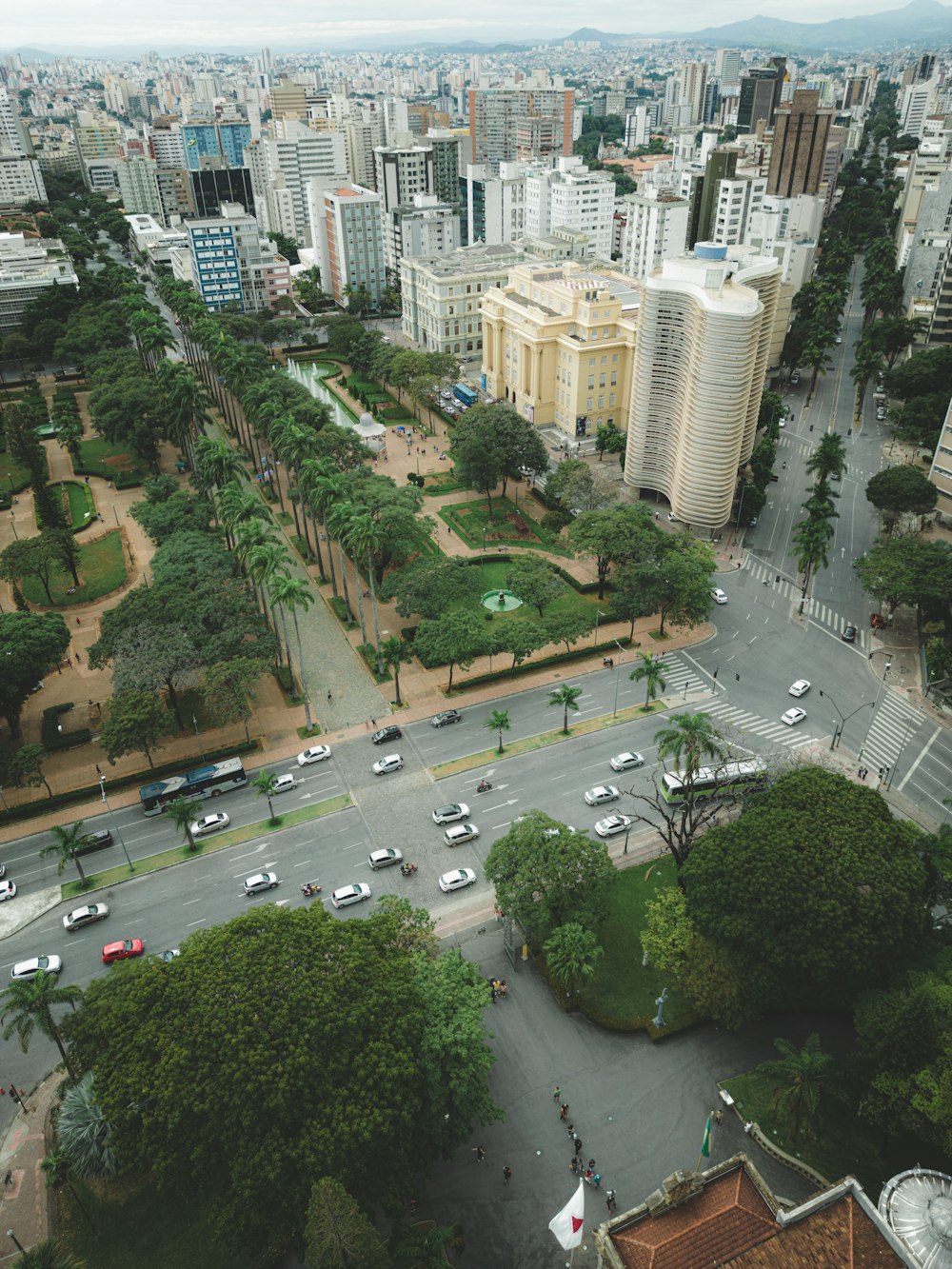 an aerial view of a city with tall buildings